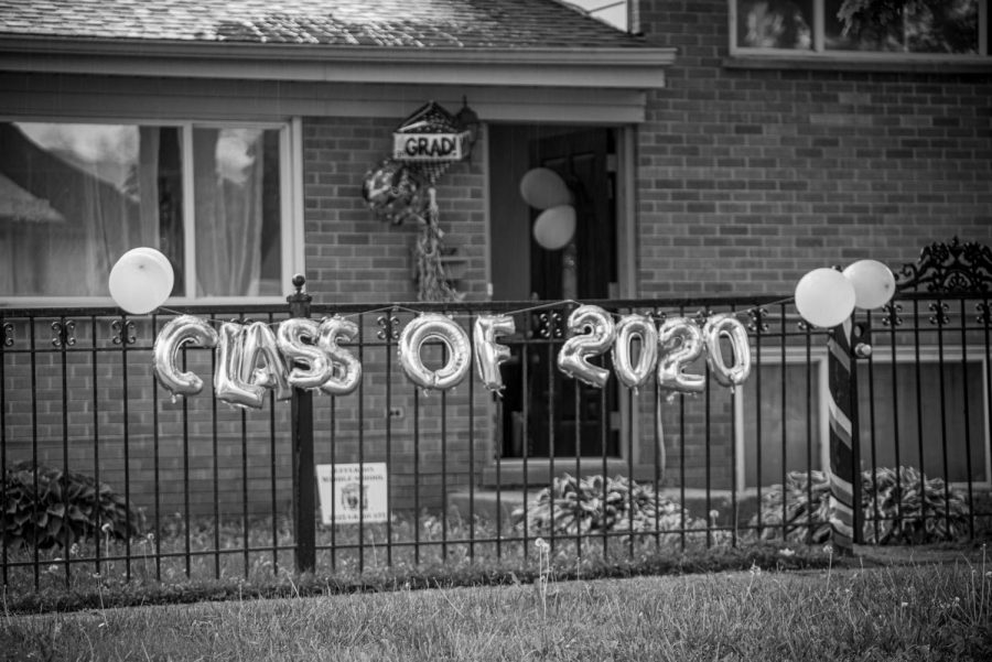 Balloons float in front of a house celebrating the graduating class of 2020 in Villa Park, IL. 