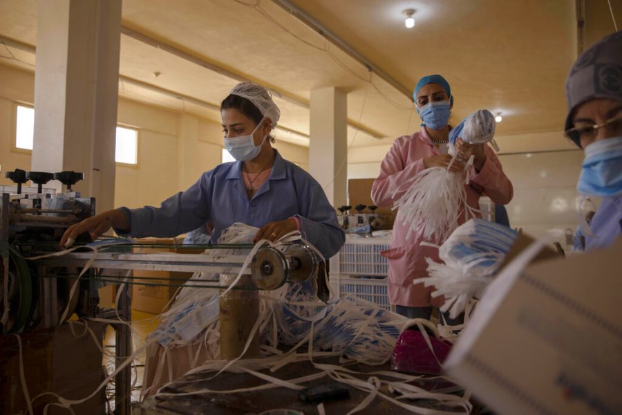 Women+working+at+Medic+Egypt+for+Medical+Clothes+company+make+protective+face+masks+to+be+used+to+help+curb+the+spread+of+the+coronavirus+at+a+factory+in+Menoufiya%2C+Egypt%2C+Saturday%2C+June+6%2C+2020.+Egypt+has+officially+ordered+its+people+to+wear+face+masks+in+public+and+private+transportation%2C+inside+government+business+and+offices+as+it+is+easing+the+partial+lockdown+imposed.+Prime+Minister+Mustafa+Madbouly+has+said+violators+would+be+fined+as+the+country+has+seen+a+jump+of+daily+reported+infections+in+the+past+week.+%28AP+Photo%2FNariman+El-Mofty%29