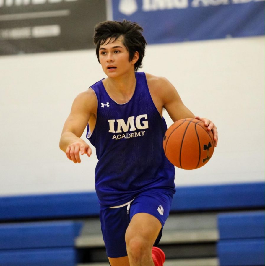 Max Williams dribbles up the basketball for IMG Academy. Williams committed to DePaul on Monday as a preferred walk-on 