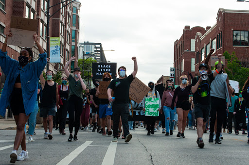 Protestors march east on Fullerton Ave.