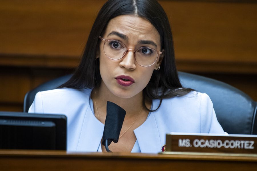 Rep. Alexandria Ocasio-Cortez, D-N.Y., questions Postmaster General Louis DeJoy during a House Oversight and Reform Committee hearing on the Postal Service on Capitol Hill, Monday, Aug. 24, 2020, in Washington. (Tom Williams/Pool via AP)