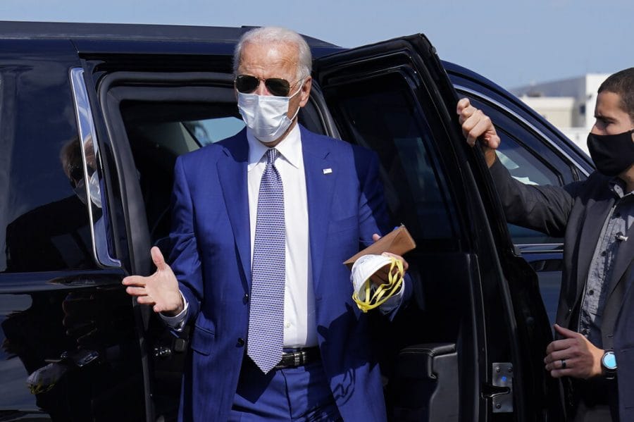 Democratic presidential candidate former Vice President Joe Biden, steps from his car as he arrives to board a plane at New Castle Airport, in New Castle, Del., Thursday, Sept. 3, 2020, en route to Kenosha, Wis. (AP Photo/Carolyn Kaster)