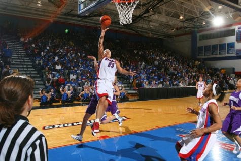 Caprice Smith drives to the basket against Northwestern. Smith was hired by DePaul to be the women's basketball team's video coordinator.