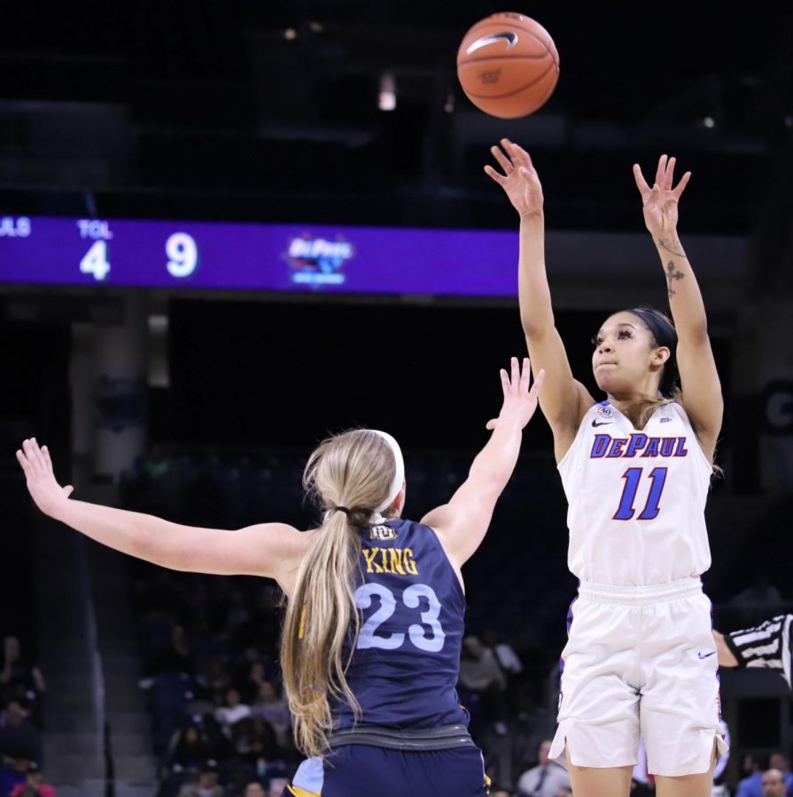 DePaul junior Sonya Morris goes up for a jump shot against Marquette on March 9.
