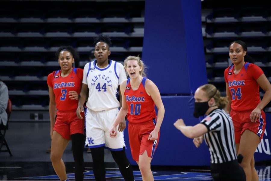 DePaul junior Lexi Held celebrates during the Blue Demons 86-82 win over Kentucky on Wednesday at Wintrust Arena. 