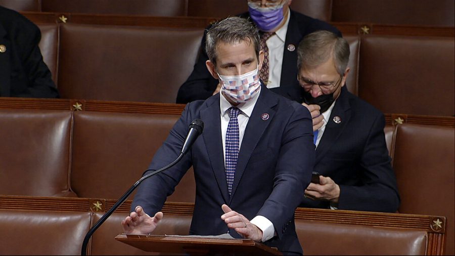 In this image from video, Rep. Adam Kinzinger, R-Ill., speaks as the House debates the objection to confirm the Electoral College vote from Pennsylvania, at the U.S. Capitol early Thursday, Jan. 7, 2021. (House Television via AP)