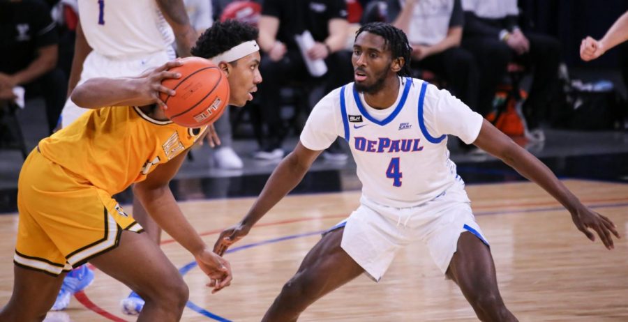 DePaul junior guard Javon Freeman-Liberty stands in front of a Valparaiso player. 