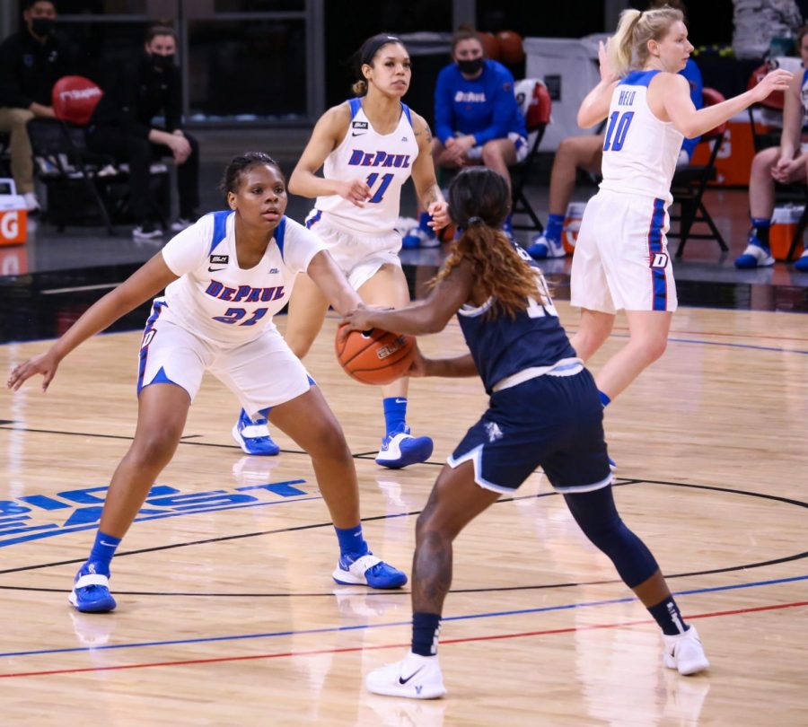 DePaul freshman Darrione Rogers defends a Villanova player on Monday at Wintrust Arena. 