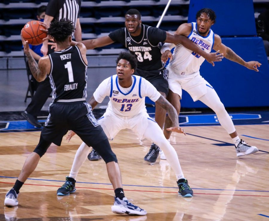 Hall defends a Georgetown player Saturday at Wintrust Arena.