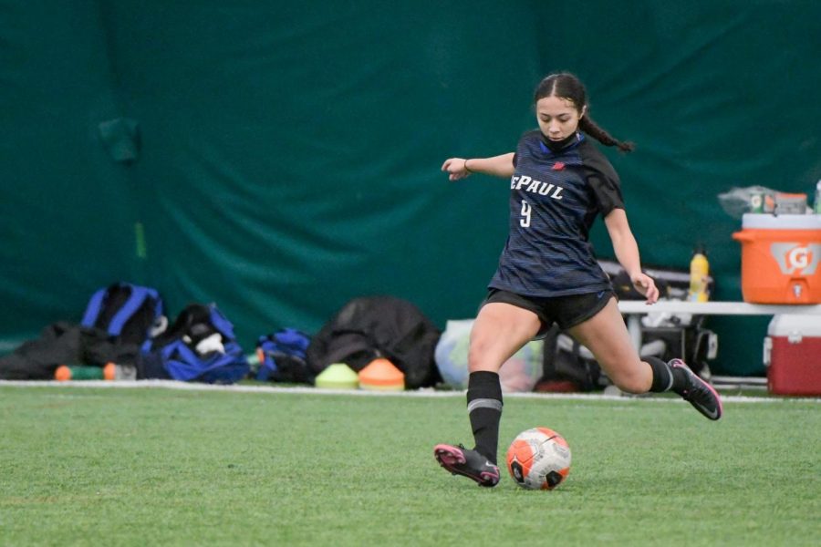 DePaul freshman defender Bella Hanisch looks to pass the ball in a game against Valparaiso on Feb. 22.