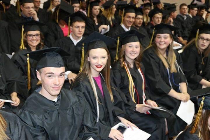 The author, second from the right, at her high school graduation.