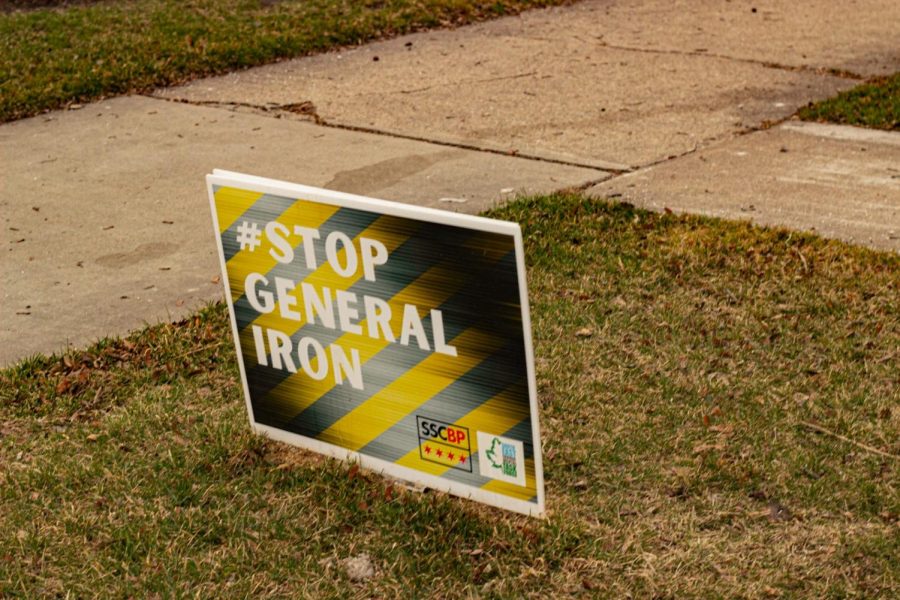 A yard sign on the Southeast side that reads Stop General Iron.