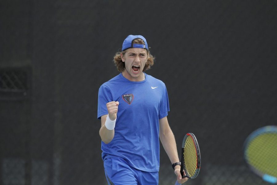 DePaul junior Vito Tonejc fists pumps after winning a point during the 2021 Big East Tournament. 