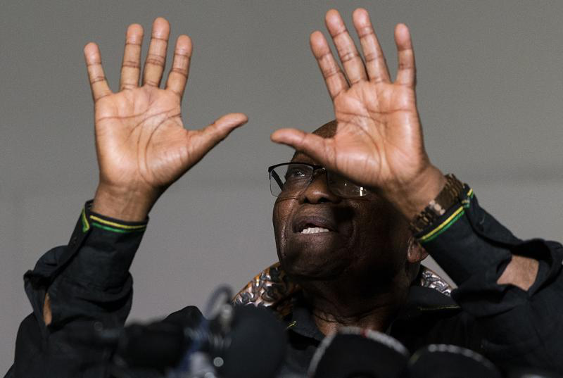Former+president+Jacob+Zuma+gestures+as+he+addresses+the+press+at+his+home+in+Nkandla%2C+KwaZulu-Natal+Natal+Province%2C+Sunday%2C+July+4%2C+2021.+Zuma+told+hundreds+of+supporters+gathered+outside+his+rural+estate+that+he+is+appealing+his+15-month+prison+sentence+and+impending+arrest+by+police.+South+Africa%E2%80%99s+top+court%2C+the+Constitutional+Court%2C+last+week+sentenced+Zuma+to+prison+for+defying+a+court+order+that+he+should+testify+before+a+commission+investigating+allegations+of+rampant+corruption+when+he+was+president+from+2009+to+2018.+%28AP+Photo%2FShiraaz+Mohamed%29