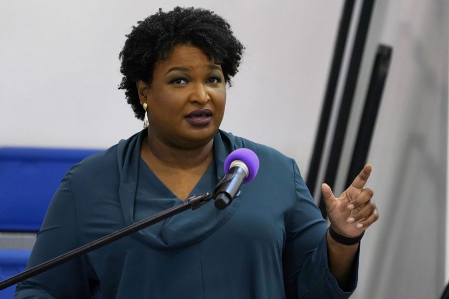 Stacey+Abrams+encourages+voters+to+vote+at+a+church+service+in+Norfolk%2C+Va.+on+Oct.+17%2C+2021%0A%28Steve+Helber%2FAP%29