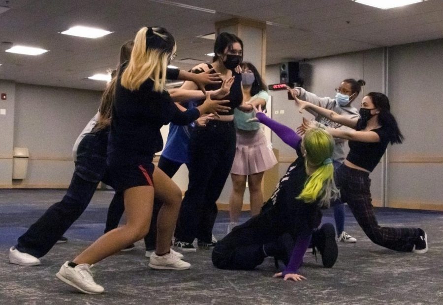 DePaul students dance to Kpop in the Student Center.