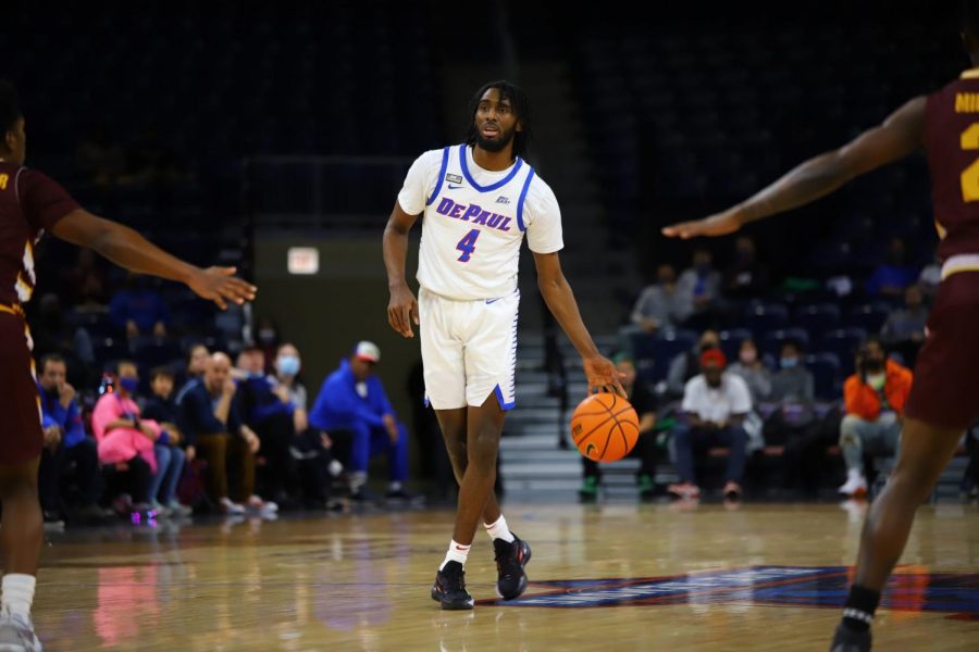 Javon Freeman-Liberty dribbles the ball up-court during the Blue Demons win over Central Michigan on November 13, 2021.