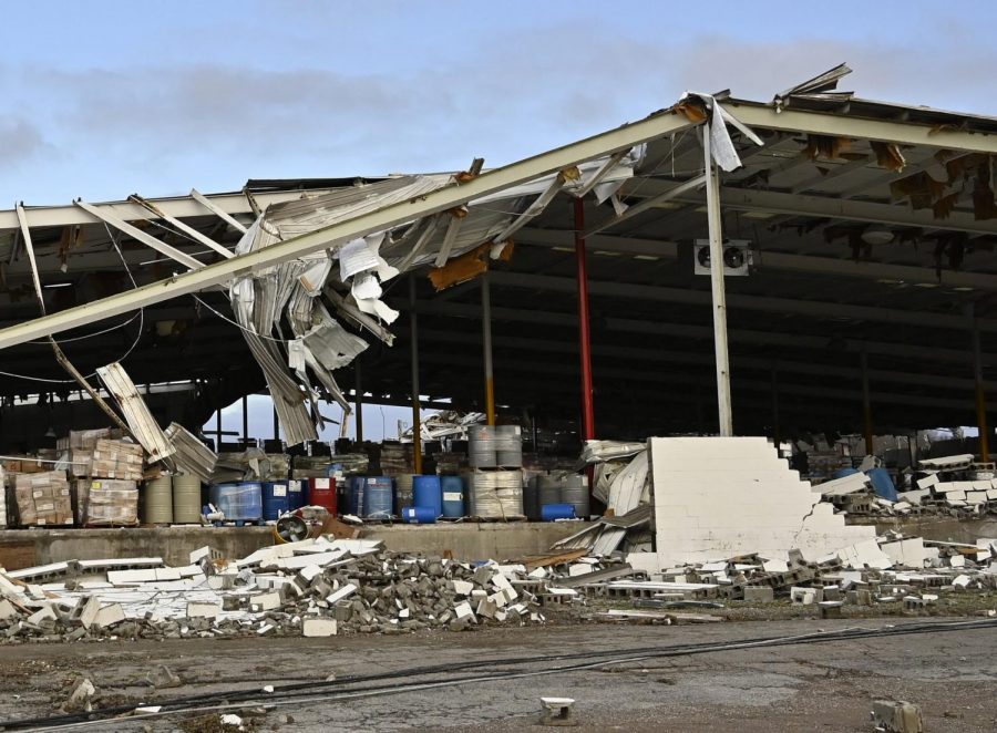 A feed store damaged by a tornado is seen in Mayfield, Ky.,on Saturday, Dec. 11, 2021. Tornadoes and severe weather caused catastrophic damage across multiple states late Friday, killing several people overnight.