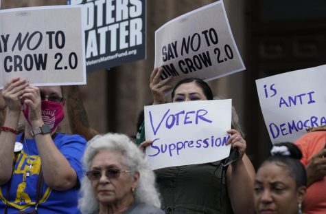 Demonstrators join a rally to protest proposed voting bills on the steps of the Texas Capitol on July 13, 2021, in Austin, Texas. 