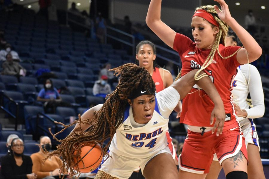 DePaul freshman forward Aneesah Morrow looks to get past her defender versus St. Johns on Friday at Wintrust Arena.