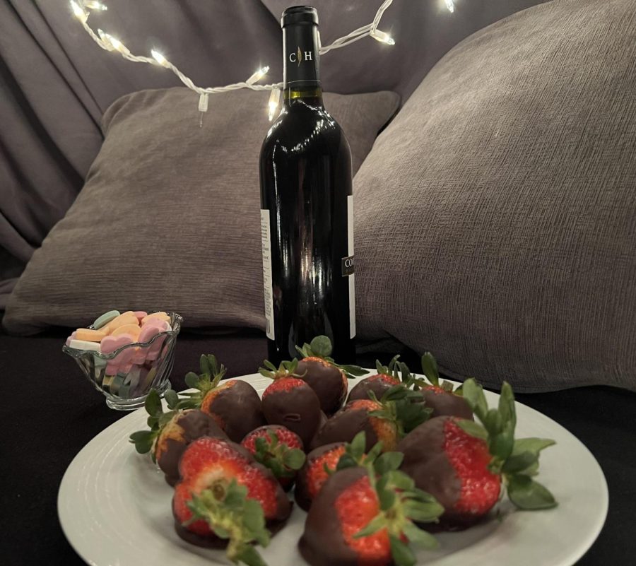 Chocolate strawberries and Candy hearts are just some of the many cheap gifts to give to your partner.