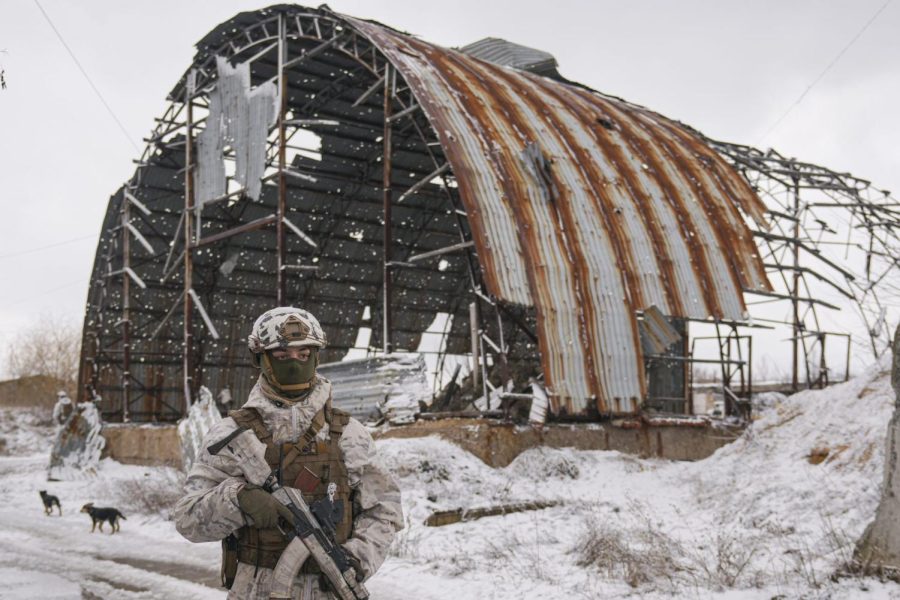 A Ukrainian serviceman provides area security in Eastern Ukraine Wednesday, Feb. 9, 2022.
