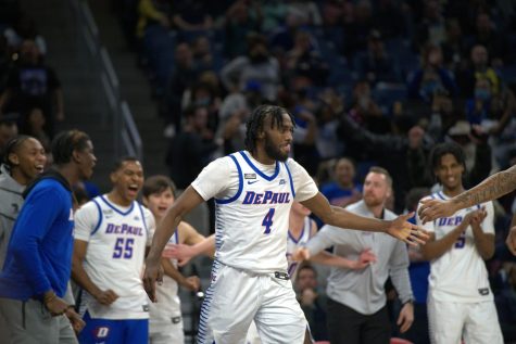 DePaul senior guard Javon Freeman-Liberty celebrates with his team during a 91-80 victory over Marquette on March 2. 