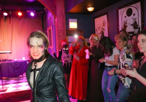 Drag queen Boots performs at Golden Dagger in Northalsted, commonly known as Boystown, as the crowd watches on March 5.