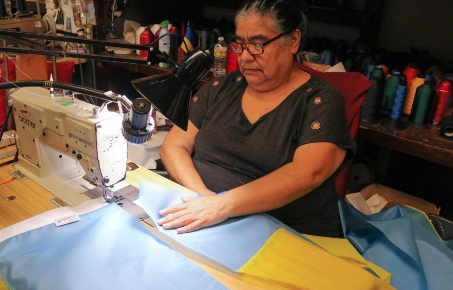 Maria+Estella+Parra%2C+59%2C+sewing+Ukranian+flags+together+at+W.G.N.+Flag+%26+Decorating+Co.+located+at+7984+S.+South+Chicago+Ave.