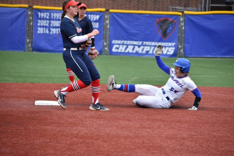 DePaul softball freshman infielder Baylee Cosgrove slides into second base in the Blue Demons' win over St. John's on April 15.