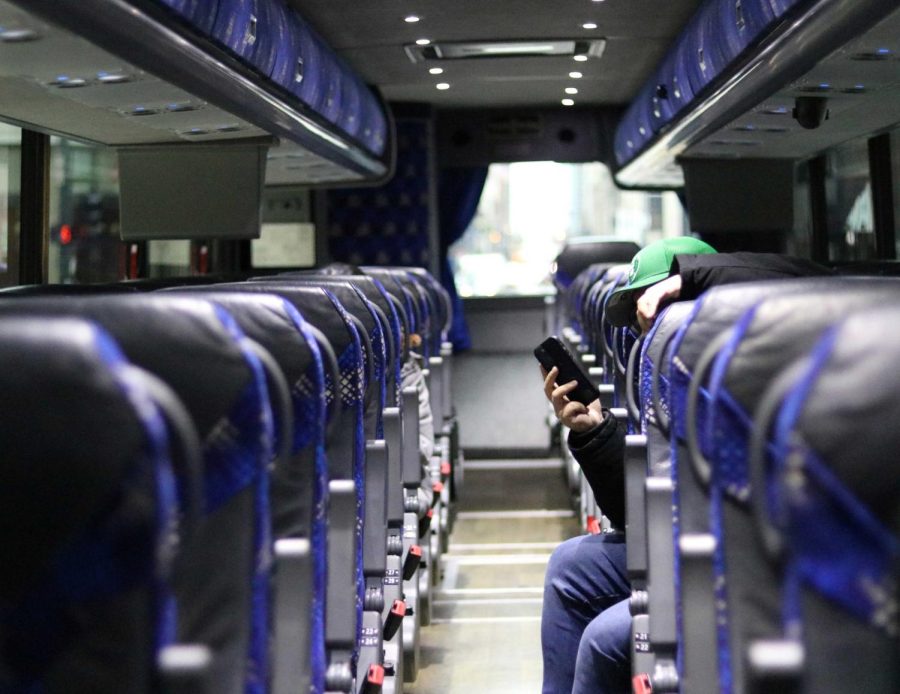 One of DePaul's shuttle buses waits in front of DePaul Center, its designated pick-up location on the Loop campus.