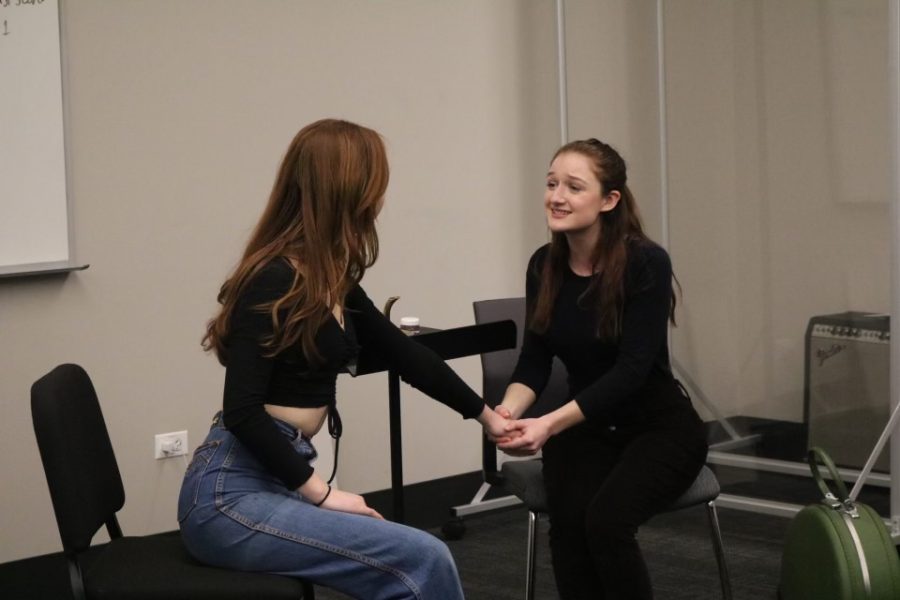 Sophomore Emma Gordon [left] rehearses with freshman Grace Provan [right].