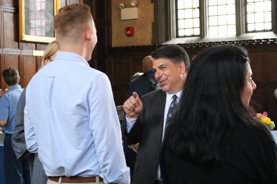 President-elect Robert Manuel meets people from DePaul during a reception Tuesday afternoon.