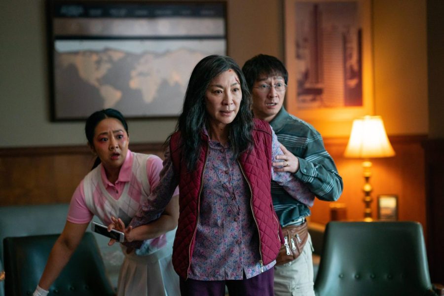 Stephanie Hsu (left), Michelle Yeoh (middle) and Ke Huy Quan (right) star within Everything Everywhere All at Once, which was released on March 30.