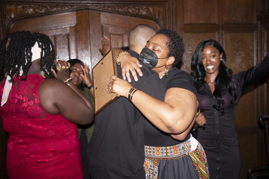 Cory Barnes, coordinator of the Black Cultural Center, and Min. Jené Ashley Colvin, Sankofa advisor and ministry coordinator for Christian and Interfaith Engagement embrace each other.