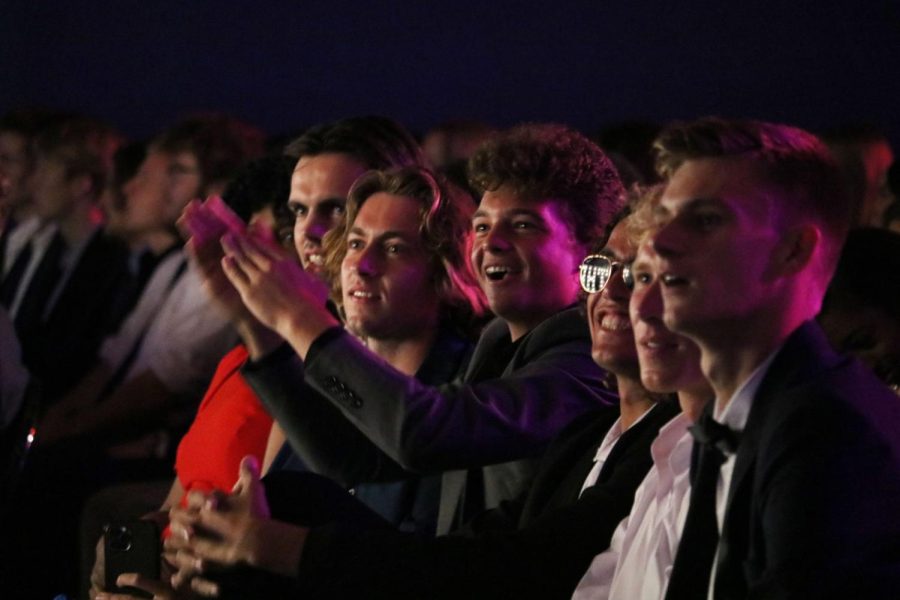 Members of the DePaul mens tennis team cheer as they watch a season recap video at the 2022 Billy Awards on May 20. The men were named Most Outstanding Team after their conference win.