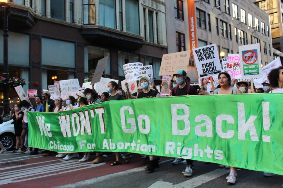 Abortion+rights+organizers+march+down+the+streets+holding+a+green+We+WONT+Go+Back%21+making+their+stance+against+the+end+of+nearly+50+years+of+abortion+rights.+