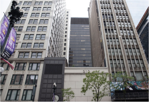 The Consumers Building (left) and the Century Building (right) stand empty on State Street as the Dirksen Federal Building looms behind them. 
