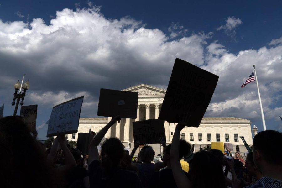 Abortion-rights activists protest outside the Supreme Court in Washington, Saturday, June 25, 2022. The Supreme Court has ended constitutional protections for abortion that had been in place nearly 50 years, a decision by its conservative majority to overturn the courts landmark abortion cases.