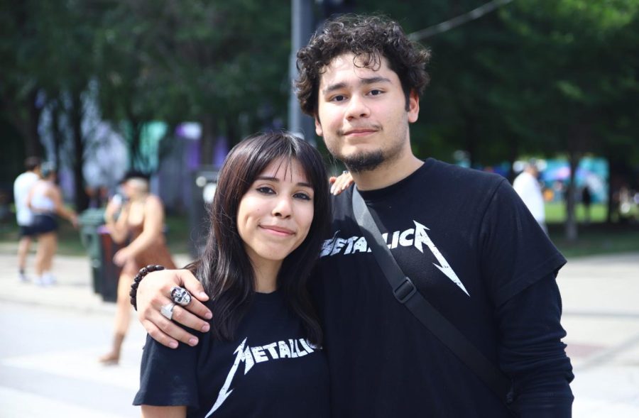Fans+Brandon+Munoz+and+Bianca+Munroy+wore+matching+Metallica+shirts+on+Thursday.+Both+longtime+and+new+fans+of+the+metal+band+attended+Lollapalooza.