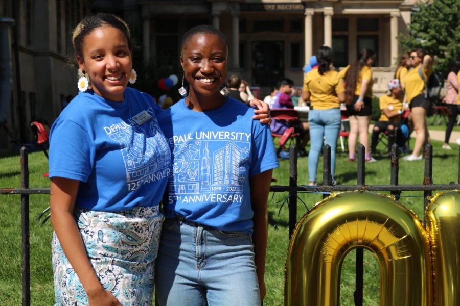 Ava Francis [right] stands with OMSS scholarship coordinator Isis Walker at an event for OMSS.
