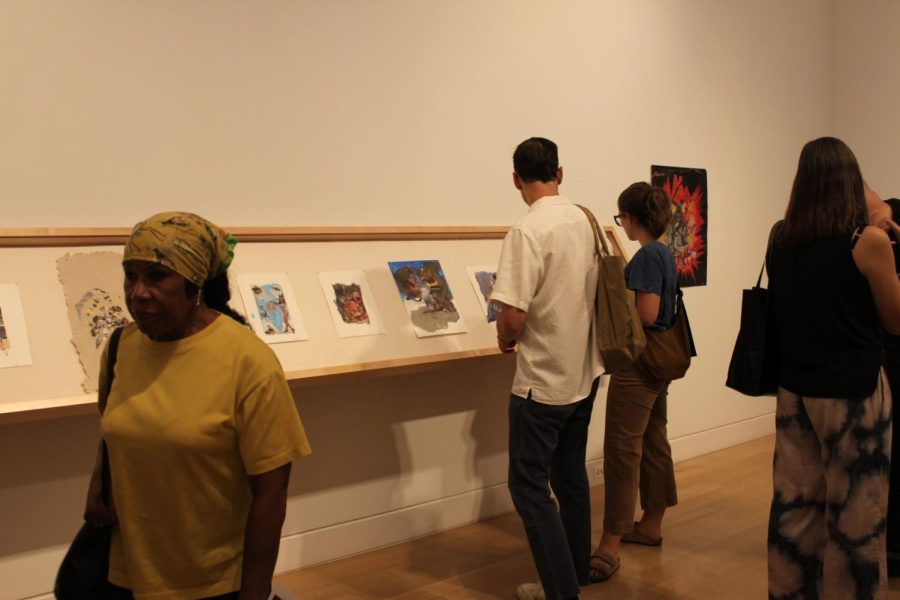 Museumgoers appraise the artwork of Krista Franklin at the DePaul Art Museum.