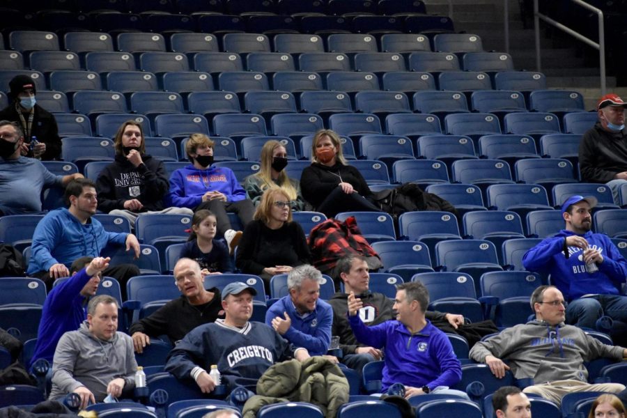 Spectators view a basketball game at Wintrust Arena.
