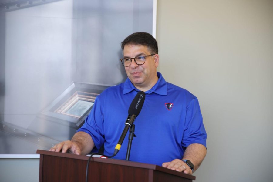 DePaul President Rob Manuel smiles to a student in a student media press conference on Sept. 1 after mentioning how students are able to walk his dog if they would like to.