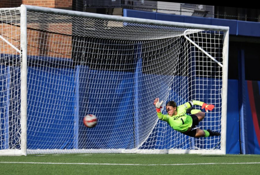 DePaul graduate goalkeeper Mollie Eriksson attempts a save in DePauls 3-1 loss to Northwestern Thursday. Eriksson recorded 13 saves in the game.