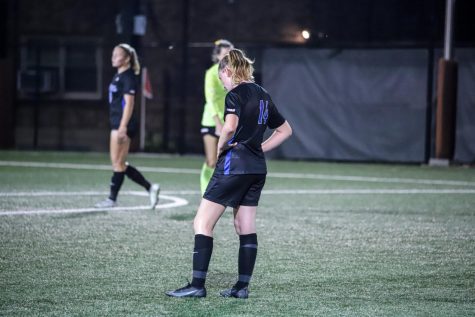 DePaul midfielder Beth Smyth hangs her head Thursday night after the Blue Demons suffered a heartbreaking 2-1 loss to Loyola.