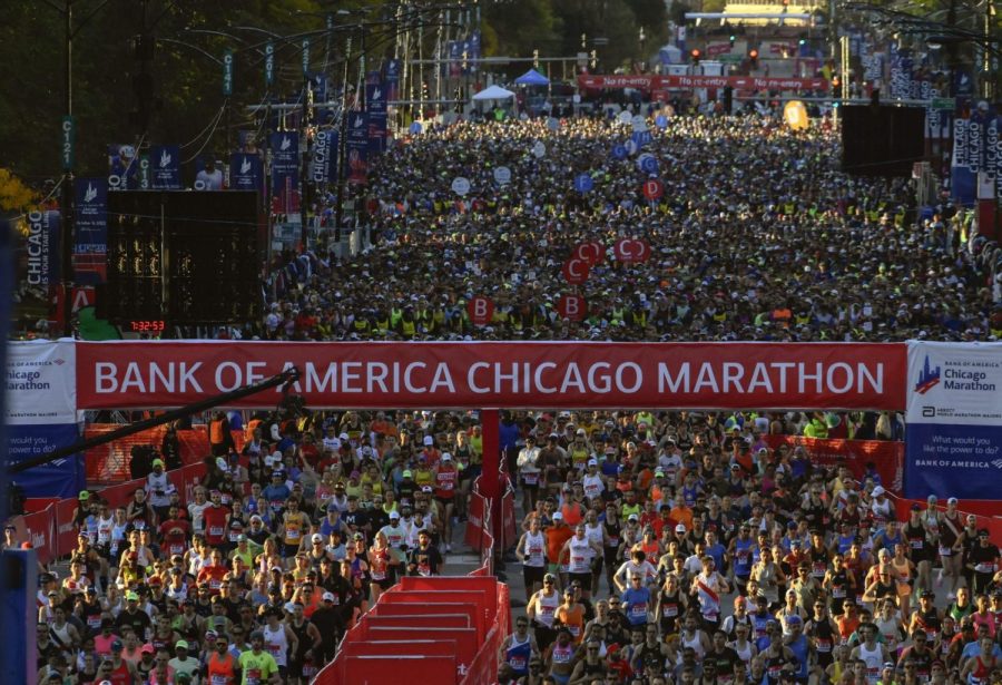 Runners start the Chicago Marathon, Sunday, Oct. 9, 2022, in Chicago. 