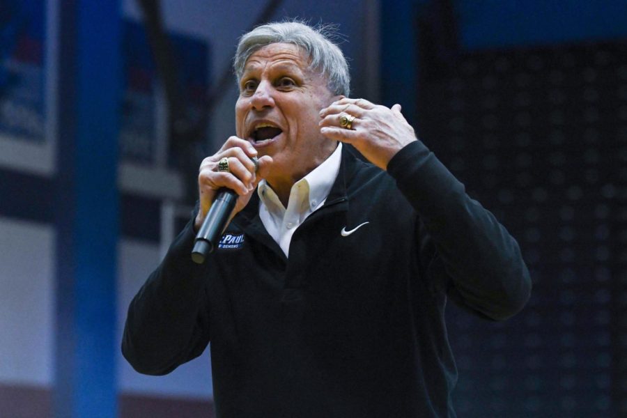 Coach Doug Bruno hypes up the crowd at Blue Madness event on Friday.