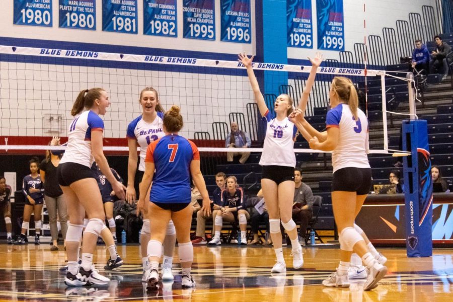 DePaul+celebrates+scoring+a+point+against+UConn+during+Saturday+nights+victory.