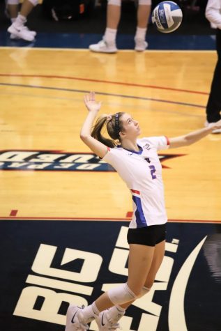Sophomore Maggie Jones attempts a spike in DePauls loss to Marquette Wednesday night.
